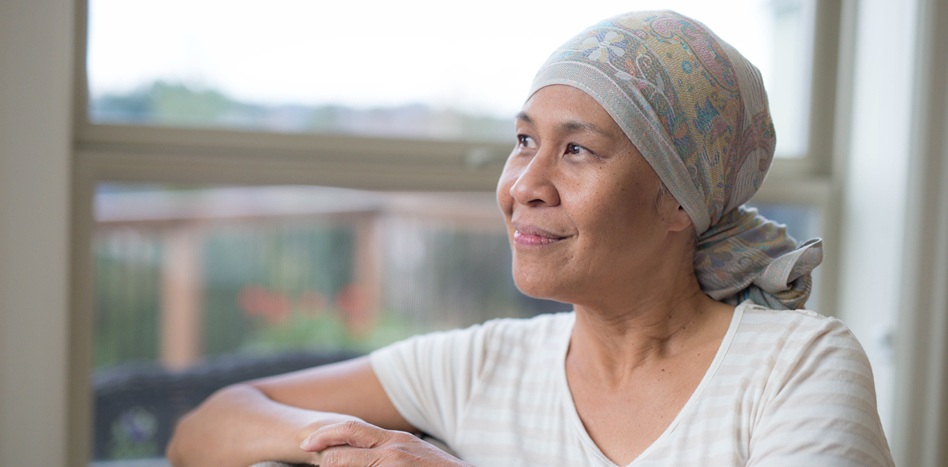 an older woman going through cancer treatment